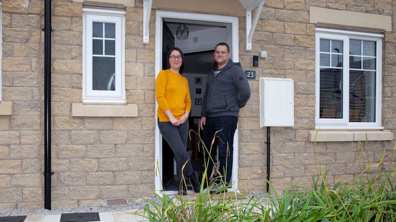 Tanya and Steven outside their new home